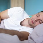 man sleeping well
